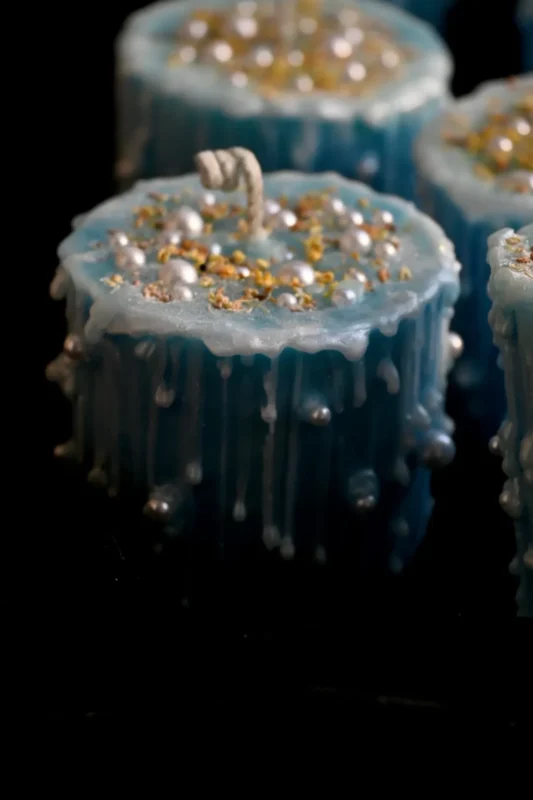 ManoMade blue coral sea fluid wax candle drip texture closeup artisan candle