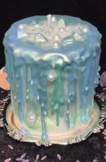 ManoMade blue coral sea fluid wax candle pearl gold detail on snow artisan candle