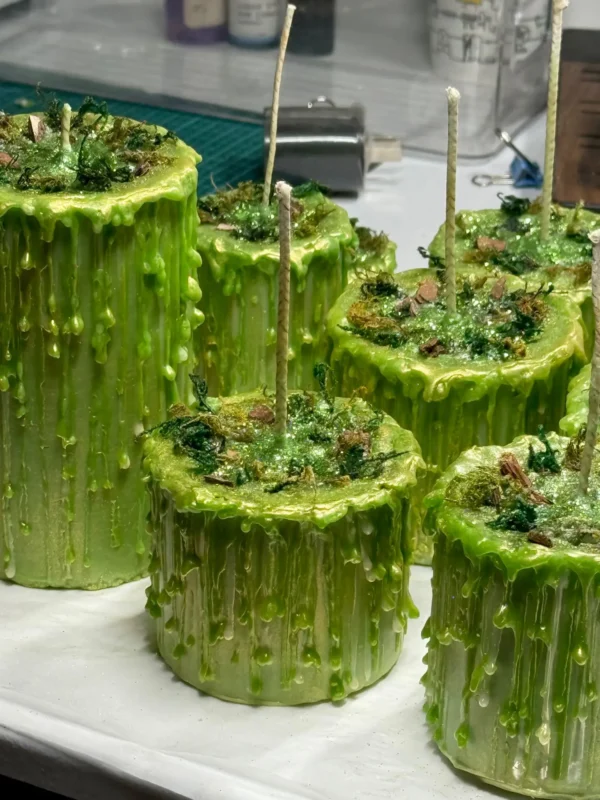 ManoMade enchanted emerald artisanal candle fluid wax pouring process artisan candle