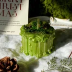 ManoMade enchanted emerald mini pomelo candle snowy Christmas display artisan candle