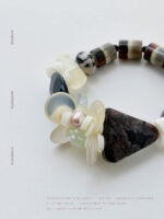 Night Garden handmade agate and pearl bracelet worn on the wrist