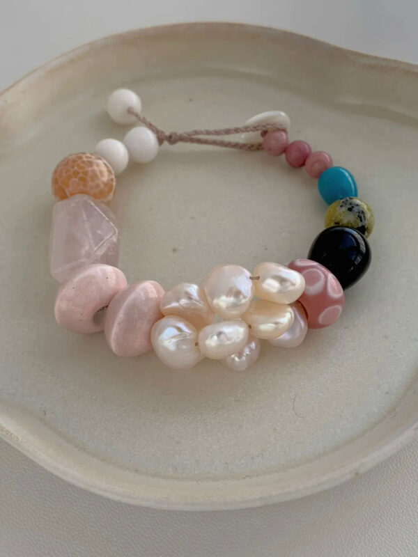 MANOMADE Peach Gummy handmade pink pearl gemstone bracelet, close up view
