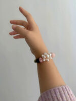 MANOMADE Peach Gummy handmade pink pearl gemstone bracelet, lifestyle view