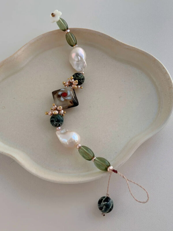MANOMADE Wild Grass and Vines handmade green gemstone freshwater pearl bracelet, close up view